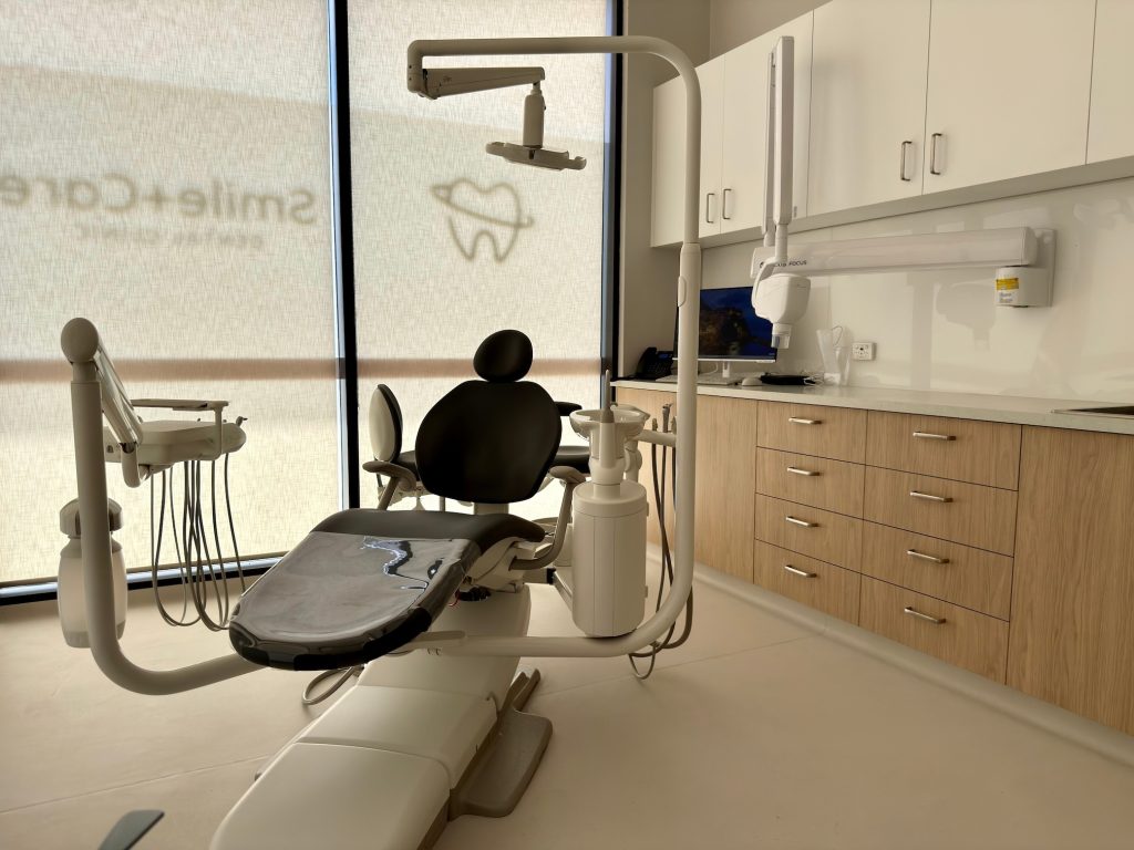 Modern dental clinic treatment room designed and built by Ace Interiors